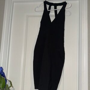 Black cocktail dress. Material hold you in and is very flattering